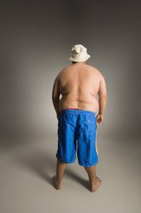 Does lying on stomach reduce belly fat?